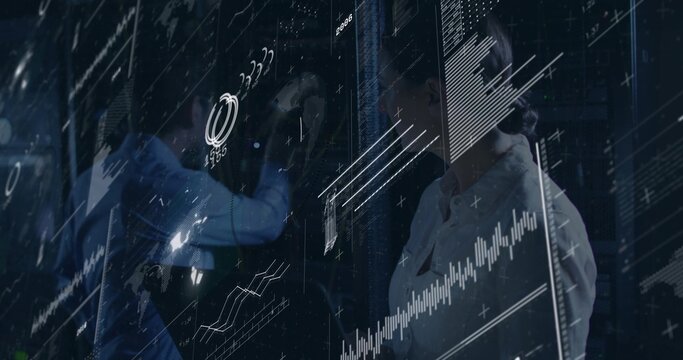 Accessing cables in server racks in data center, engineers in business shirts viewing AR overlay