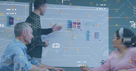 Collaborating casual professionals discussing mockups on whiteboard in meeting room, with overlays