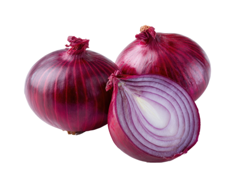 Three red onions, one halved, on black background