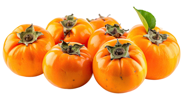Seven orange persimmons clustered together on a black background