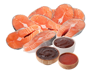 vibrant salmon steaks arrangement paired with dipping sauces, perfect for culinary displays, seafood promotions, and gourmet cooking imagery showcasing fresh colors