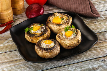 Baked champignon with quail egg
