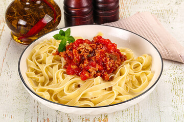 Italian pasta linguine Bolognese with meat