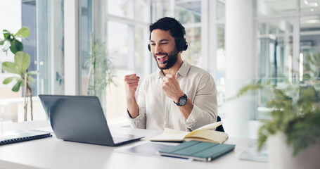 Man, celebration and laptop with headset at office, excited or deal with notification at finance...