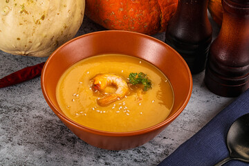 Pumpkin cream soup with prawns