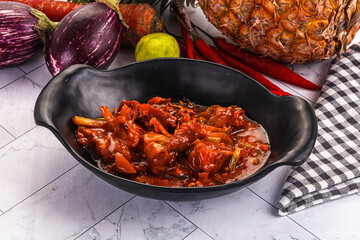 Asian cuisine - pork in chili sauce