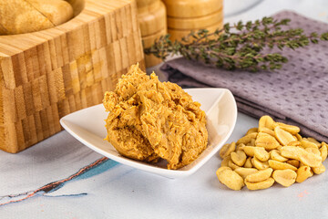 Crunchy peanut butter fat product