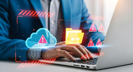 Businessman is typing on laptop with cloud and folder warning alert sign
