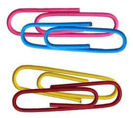an overhead shot of various colorful paperclips arranged on a black surface showing abstract patterns with school or office supply concept