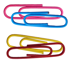 an overhead shot of various colorful paperclips arranged on a black surface showing abstract patterns with school or office supply concept