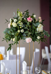 A beautiful floral bouquet above a festively decorated table