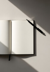 Modern workspace inspiration awaits with this blank notebook and sleek pen, ready for your creative ideas and professional planning in soft, natural light