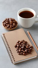Rustic Flat Lay Of Roasted Coffee Beans With A Notebook And Cup Of Black Coffee On A Grey Background
