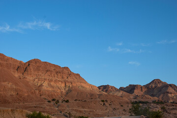 Desert cliffs of the Judean Desert under clear blue sky
