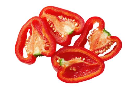 Vibrant red pepper halves, glistening seeds and white pith
