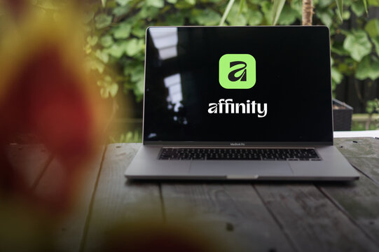 Affinity Studio by Canva logotype displayed on MacBook Pro screen