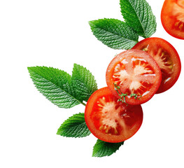 Fresh red tomato slices with green leaves on a black background