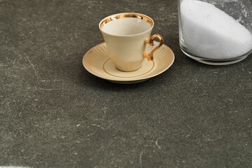 Cup and sugar bowl for drinking coffee in the kitchen.