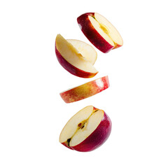 Sliced red apple segments suspended in mid-air, crisp and fresh