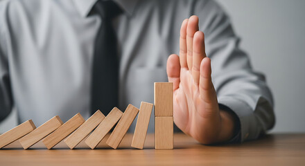Stop Domino Effect Businessman Halting Falling Blocks Represents Crisis Management