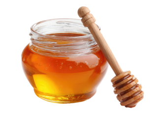 Glass jar with golden honey and wooden dipper