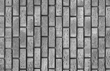 A grunge gray and brown texture of an old wooden wall shows a distressed wood pattern suitable for rustic architecture design