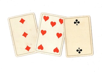 A hand of vintage playing cards isolated on a white background.