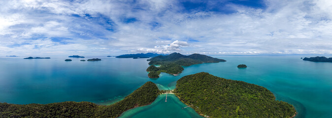 Breathtaking view over Ko Ngam beach showcasing vibrant turquoise waters and verdant islands under a blue sky. A perfect tropical paradise for relaxation and exploration Thailand © Fokke Baarssen