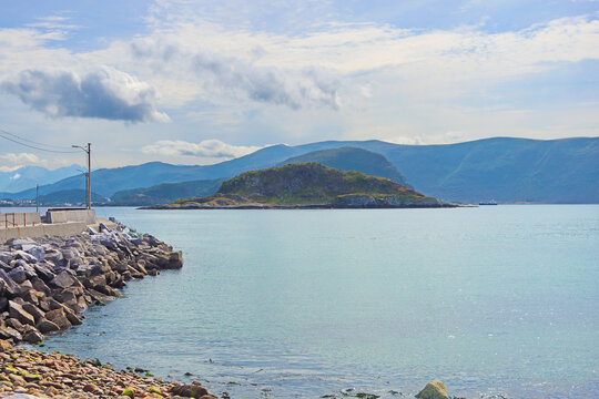View on the shore with Atlantic Ocean and Alnes island in the background, Giske island, Norway