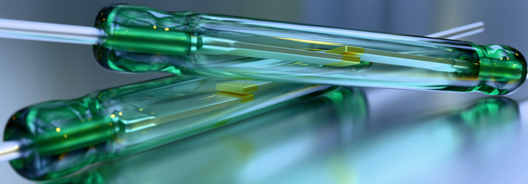Reed Switch - Reed Relay - Electronic components. Closeup of a magnetically operated, green glass reed switch type SPST with Gold flashed contacts in the open position.	
