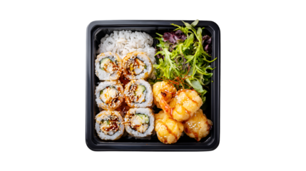 A takeout container filled with a Japanese meal of shrimp tempura sushi rolls fried shrimp white rice and a fresh side salad viewed from above