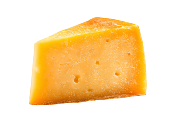 A wedge of aged cheddar cheese with a rich orange hue isolated on a black background