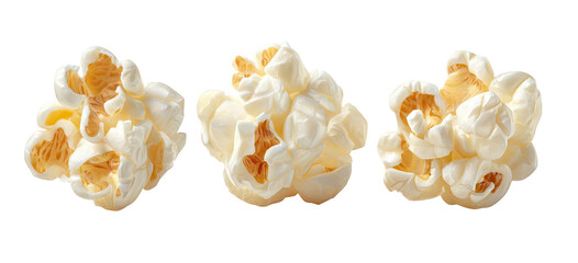 Three clusters of fluffy popped corn on a black background