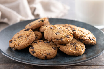 Chocolate chip cookies for breakfast on wooden table