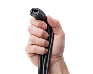 Hand holding a coiled black cable with a connector end