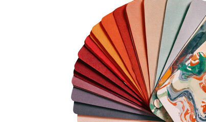 Fan of paper swatches in warm and cool tones, some marbled
