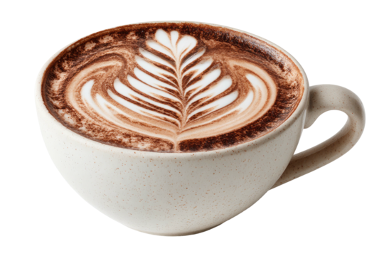 A creamy coffee drink with intricate frothy art in a textured cup