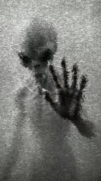 Creepy Scene - Alien Figure with Elongated Head Black Eyes and Wrinkled Skin Pressing Hand Against Foggy Surface in Dim Light, Animation Made of Sharp Fragments