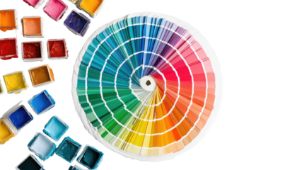 Vibrant watercolor paints and a circular color palette arranged artistically