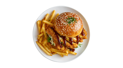 An overhead view of a crispy chicken katsu sandwich on a sesame seed bun drizzled with sauce and served with golden french fries on a white plate