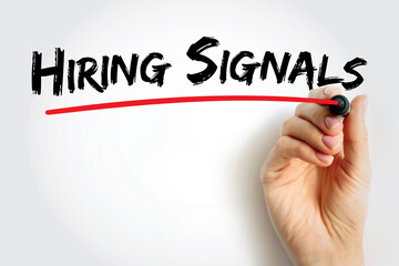 Hiring Signals text handwritten by hand with red underline, representing recruitment insights, workforce demand indicators, and job market analytics visualization concept