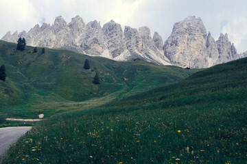 Mountain landscape along the road to Gardena Pass, Dolomites, Italy