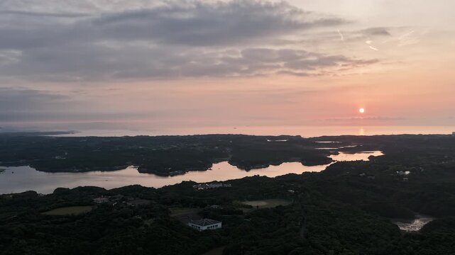 Pastel sunrise over Ago Bay, tranquil aerial timelapse in Mie, Japan