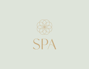 A serene spa logo featuring a delicate flower design, accompanied by soft and calming colors, which conveys relaxation and tranquility, perfect for a rejuvenating experience.
