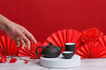Chinese New Year tea ceremony with elegant teapot and cups