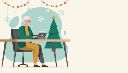 Happy senior woman working on tablet at Christmas desk Holiday business concept with copy space