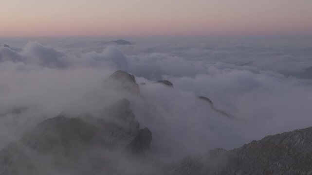 Cloud sea surronding the Aizkorri peak, highest peak of Euskadi at the Basque Country.