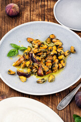 Fried seafood on a plate, mussels.