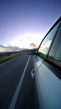 Cinematic Car Driving on Countryside Road Rear Camera View, 4K Vertical Video. Driving two cars in the opposite direction.
