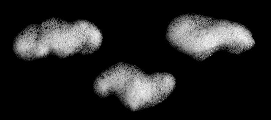 Isolated white soap bubbles on black background. Abstract detergent bubble pattern conveying...